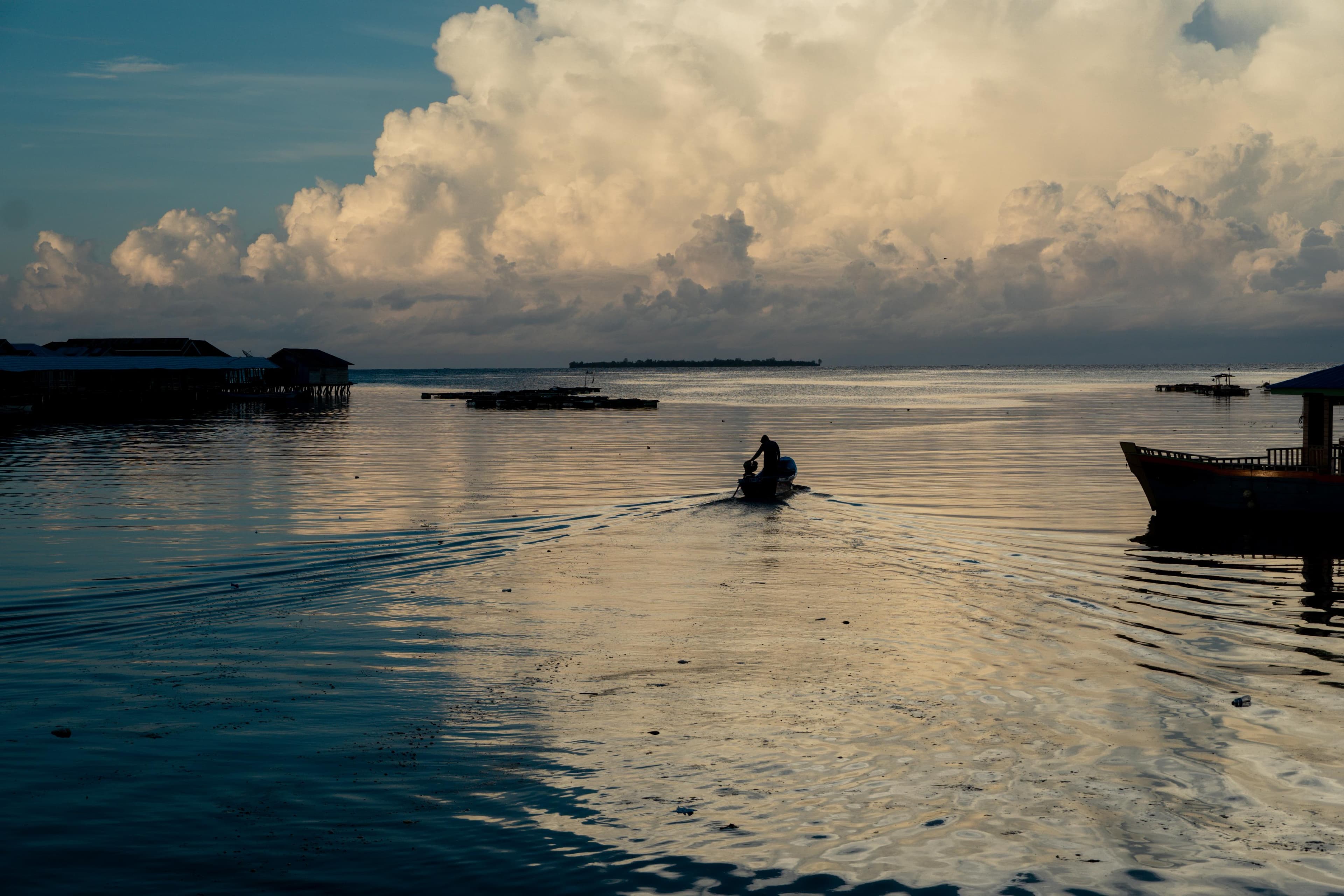 Torosiaje Fisherman on his way to the open water